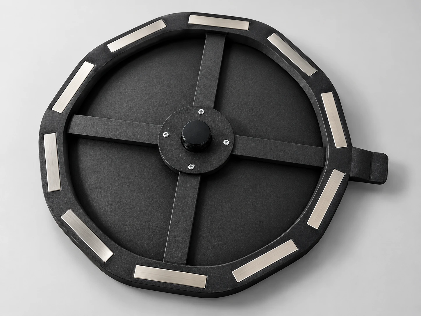 The magnetic vibration dampener with perimeter magnets and a central adjustment.